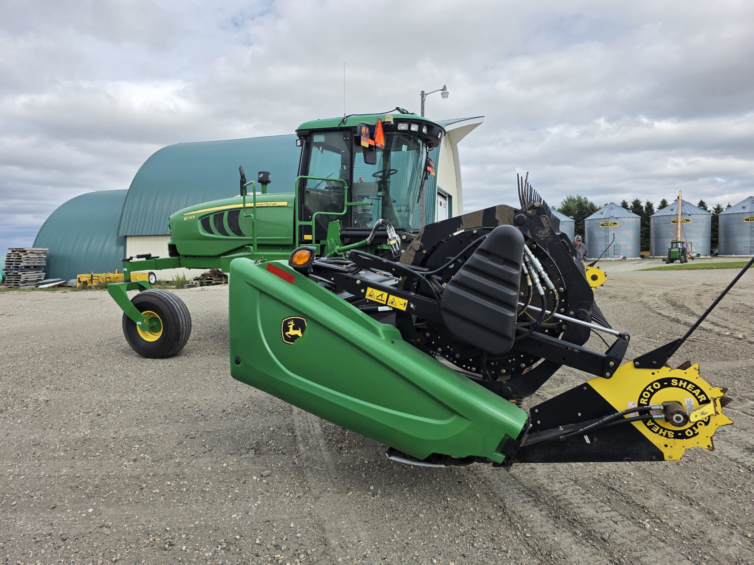 2026/09/1000264181-scaled.jpg 2017 John Deere W155 (Macdon M155) swather + D435 (D65) 30ftheader - Image 1